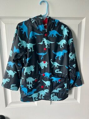 Hatley Navy Raincoat with Bright Blue Dinosaur Print and Red Lining